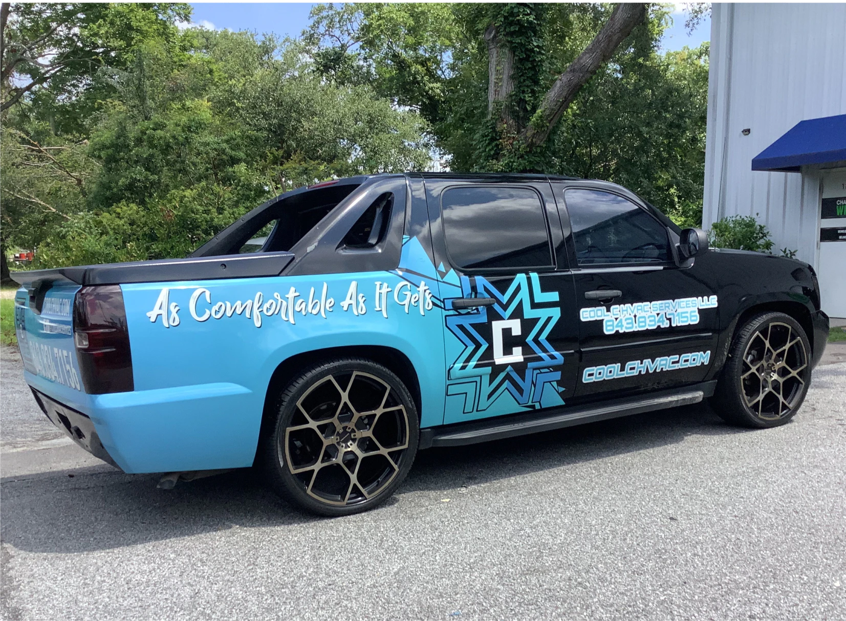 c wrapped pickup truck